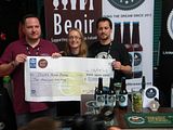 Reuben Gray of Beoir presents a cheque to Maudeine and Sam Black of Kinsale Craft Brewery