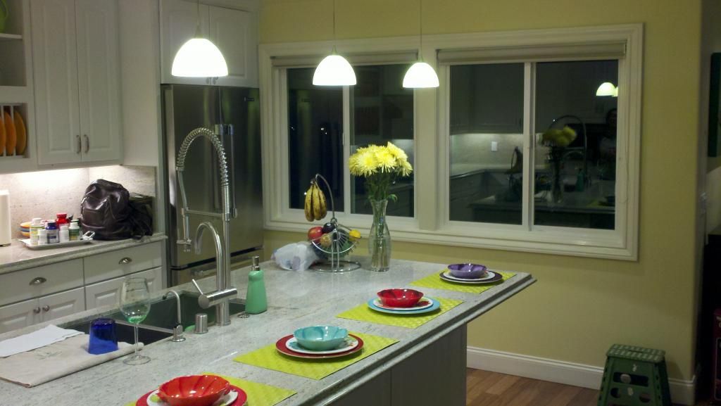 The old dining area now part of the kitchen New remodeled kitchen with windows and views