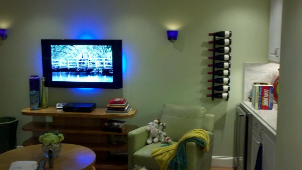 Happy living room with booze close at hand Newly remodeled living room with happy lights flatscreen TV Lesparre