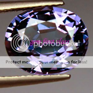   Russian Color Change Alexandrite Oval Gemstone 11x9.2x6.2 mm.  